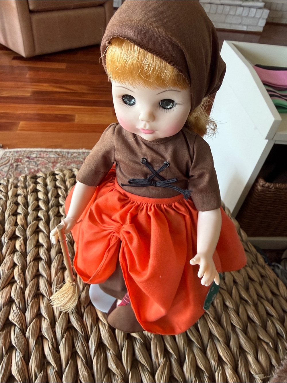 Vintage-Style Child Doll in Brown Hood and Orange Skirt